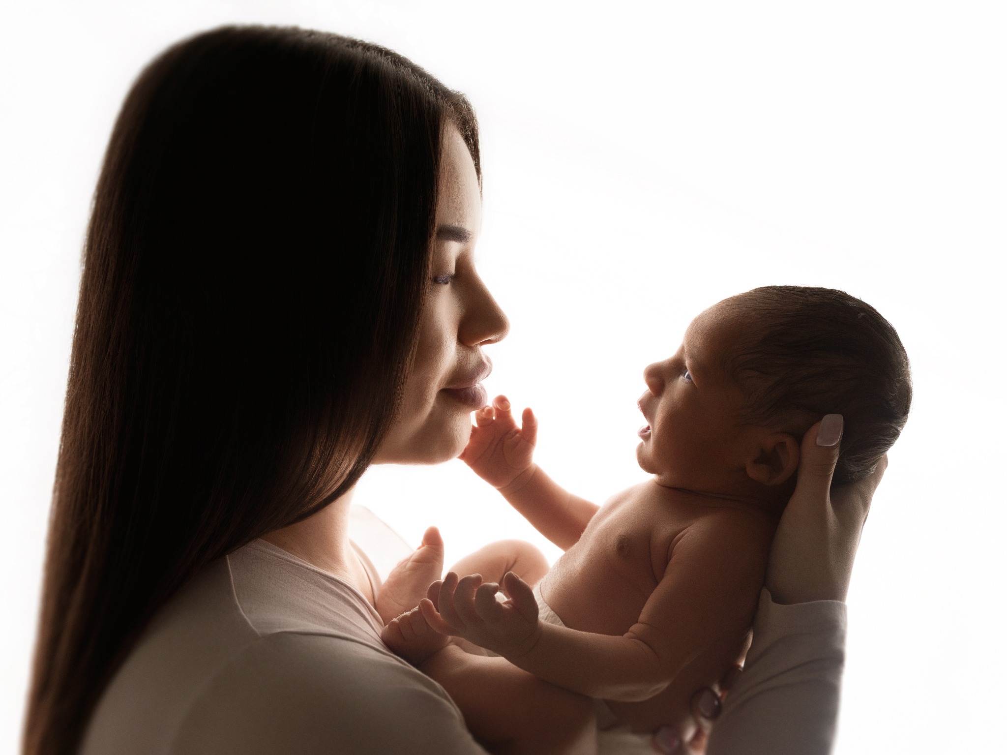 Mother holding her newborn baby